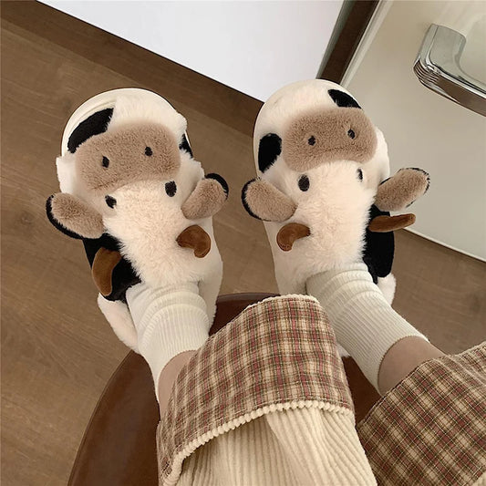 Women's slippers with cow emblem